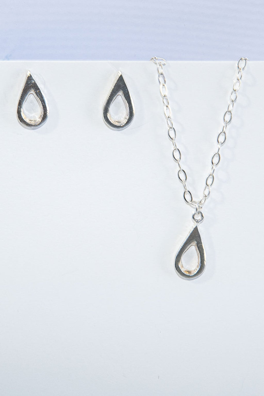 Meaningful silver teardrop necklace. Elegant hammered pendant with purpose—15% donated to LLS. Jewelry that gives back with every purchase.