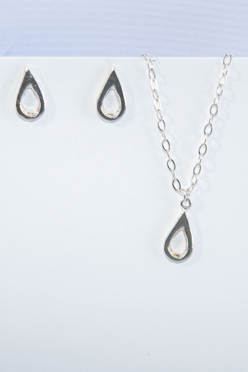 Meaningful silver teardrop necklace. Elegant hammered pendant with purpose—15% donated to LLS. Jewelry that gives back with every purchase.