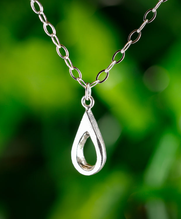 Handmade sterling silver teardrop pendant. A meaningful gift of hope—15% donated to LLS to fund cancer research and support patients.