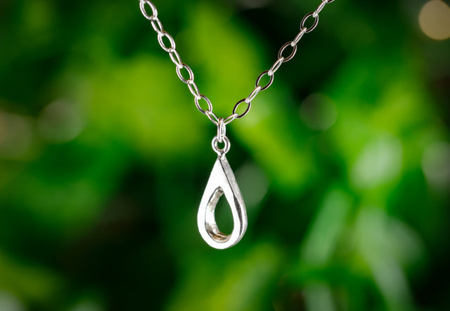 Handmade sterling silver teardrop pendant. A meaningful gift of hope—15% donated to LLS to fund cancer research and support patients.