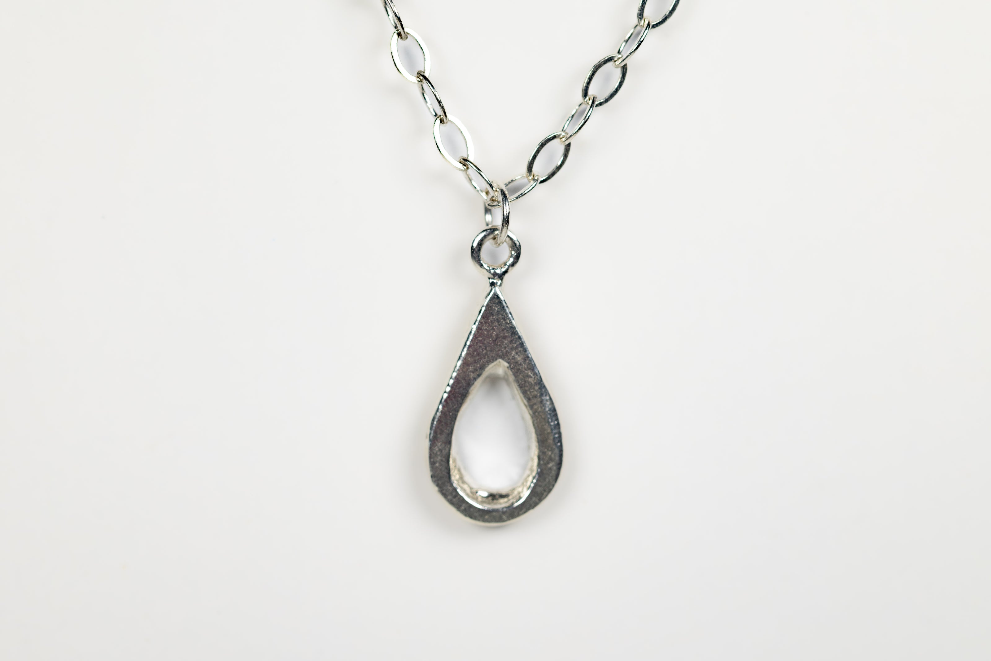 Handmade sterling silver teardrop pendant. A meaningful gift of hope—15% donated to LLS to fund cancer research and support patients.