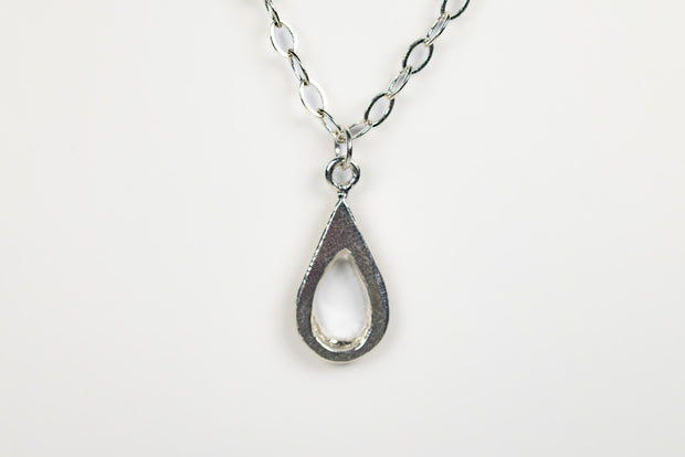 Handmade sterling silver teardrop pendant. A meaningful gift of hope—15% donated to LLS to fund cancer research and support patients.