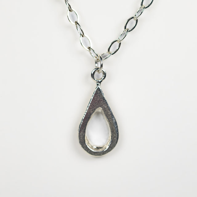 Handmade sterling silver teardrop pendant. A meaningful gift of hope—15% donated to LLS to fund cancer research and support patients.