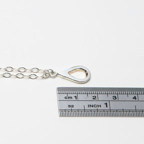 Meaningful silver teardrop necklace. Elegant hammered pendant with purpose—15% donated to LLS. Jewelry that gives back with every purchase.