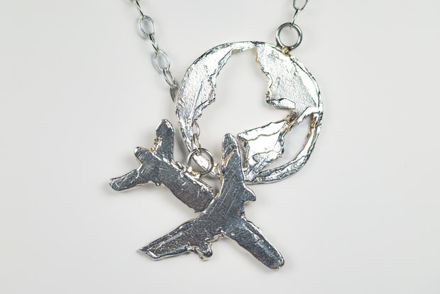 sterling_silver_travel_necklace_plane_and_earth