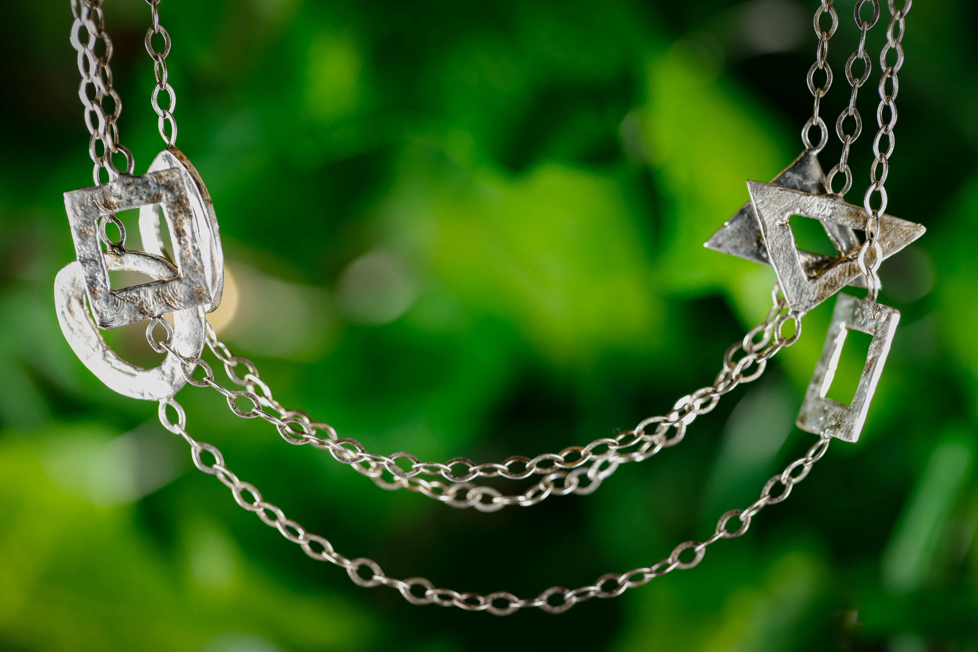 sterling_silver_assorted_shape_long_necklace_with_matching_earrings