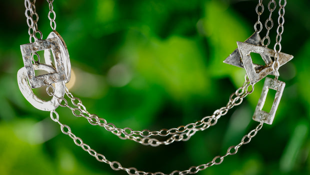 sterling_silver_assorted_shape_long_necklace_with_matching_earrings