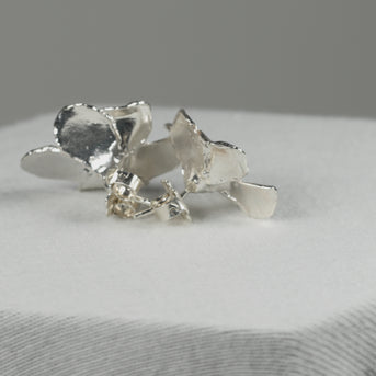 dainty_bloom_flower_post_earrings_in_silver