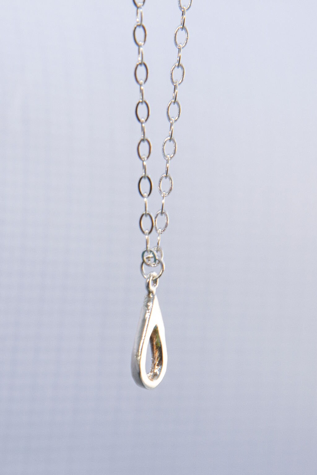 Meaningful silver teardrop necklace. Elegant hammered pendant with purpose—15% donated to LLS. Jewelry that gives back with every purchase.