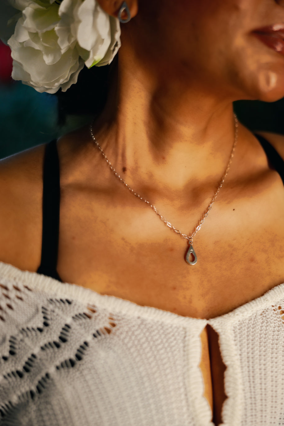 Handmade sterling silver teardrop pendant. A meaningful gift of hope—15% donated to LLS to fund cancer research and support patients.